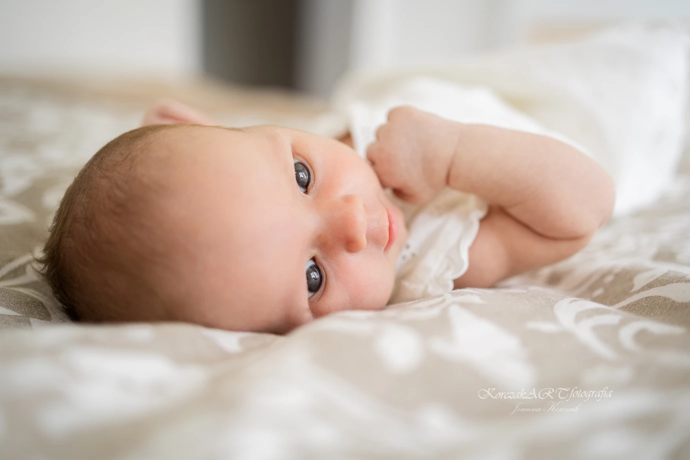 zdjęcia radzymin fotograf joanna-korczak-korczak-art-fotografia portfolio zdjecia noworodkow sesje noworodkowe niemowlę